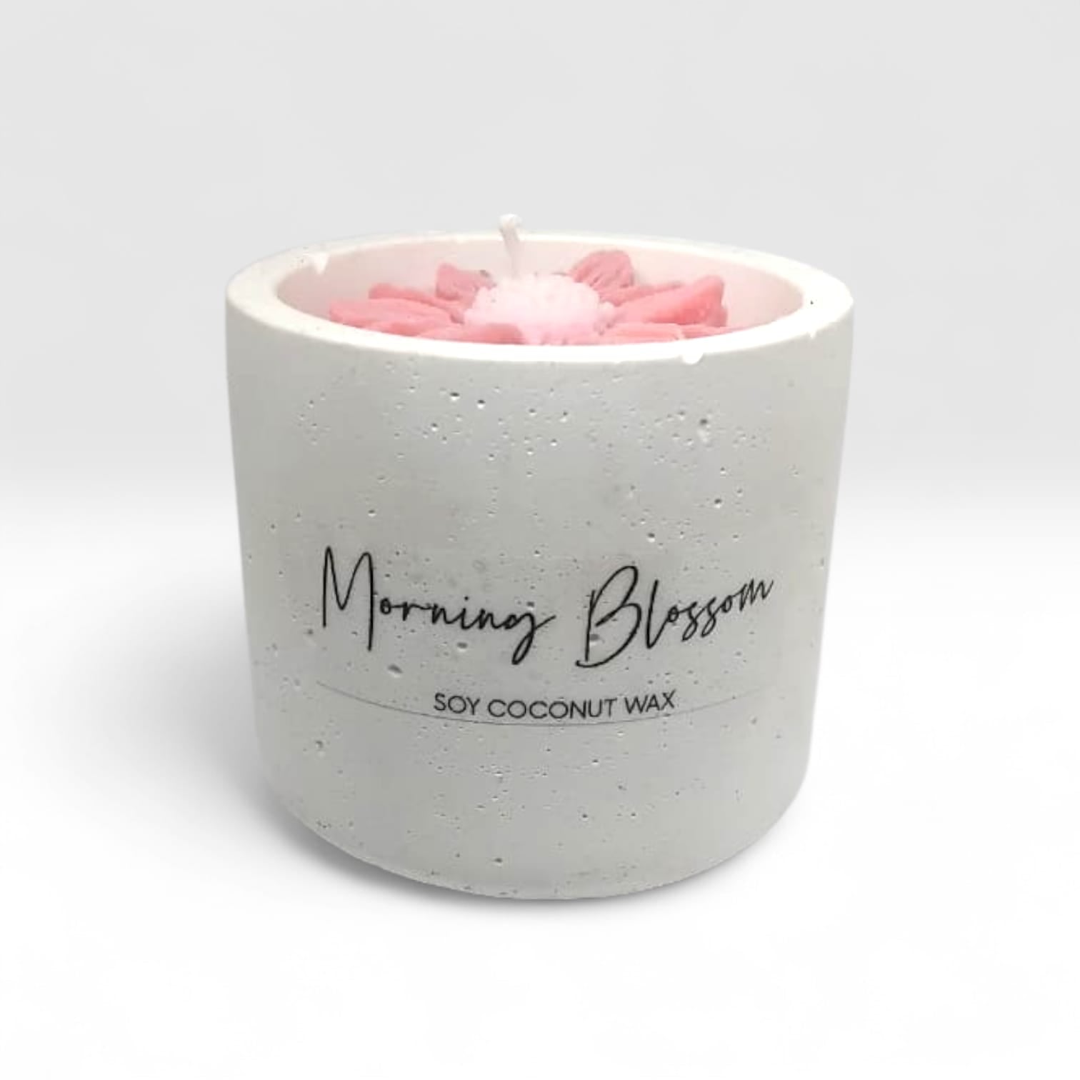 Luxury hand-poured soy wax candle in a handcrafted vessel with uplifting message