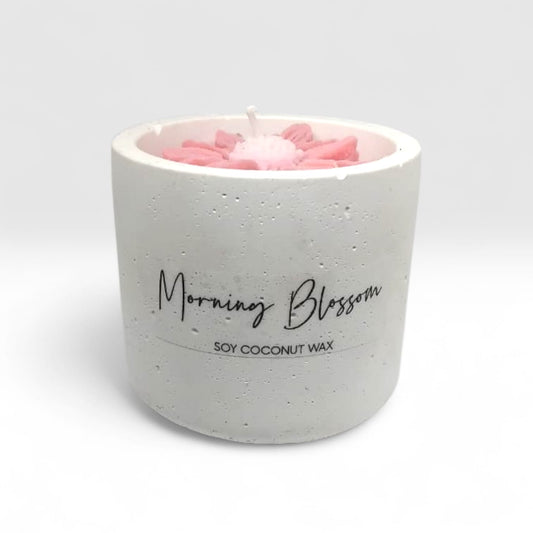 Luxury hand-poured soy wax candle in a handcrafted vessel with uplifting message