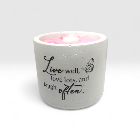 Luxury hand-poured soy wax candle in a handcrafted vessel with uplifting message