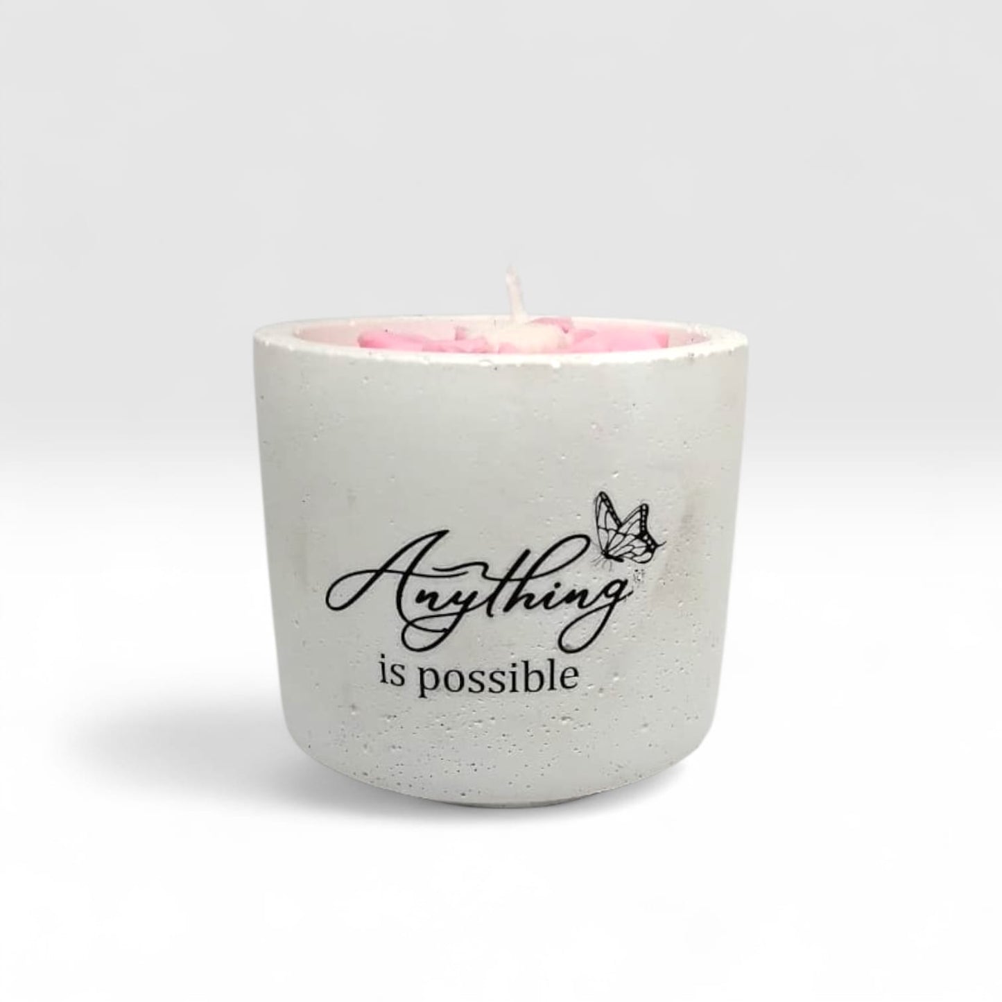 Luxury hand-poured soy wax candle in a handcrafted vessel with uplifting message
