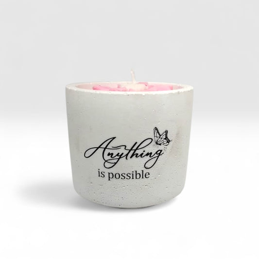 Luxury hand-poured soy wax candle in a handcrafted vessel with uplifting message